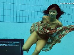 Russian Teen Diving While Showing Off Her Natural Tits
